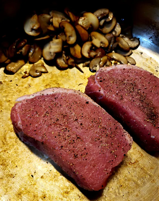 Pan searing thick boneless pork chops with mushrooms