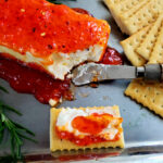 holiday cheese ball with appetizer spreader with crackers