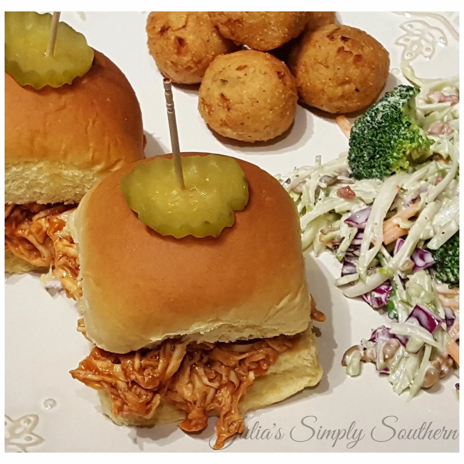 BBQ Chicken Sliders served with slaw and hush puppies