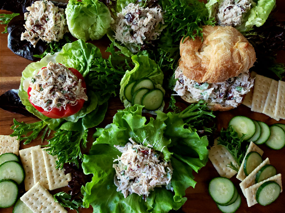 Platter with chicken salad served a variety of ways