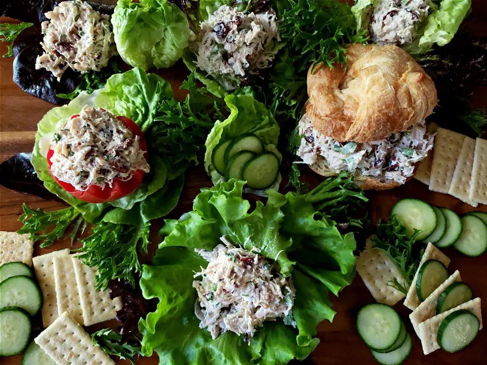 https://juliassimplysouthern.com/wp-content/uploads/Platter-with-chicken-salad-on-lettuce-stuffed-tomato-sandwich-croissant-crackers-Julias-Simply-Southern-pantry-staples.jpg.webp