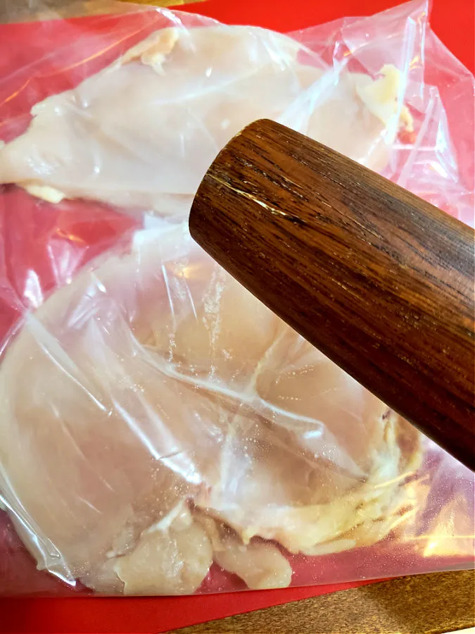 pound chicken to flatten to equal thickness