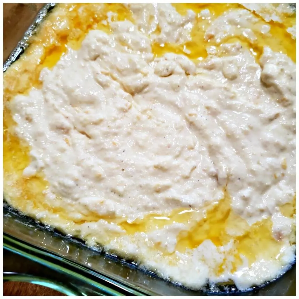 Cornbread batter in a buttery baking dish