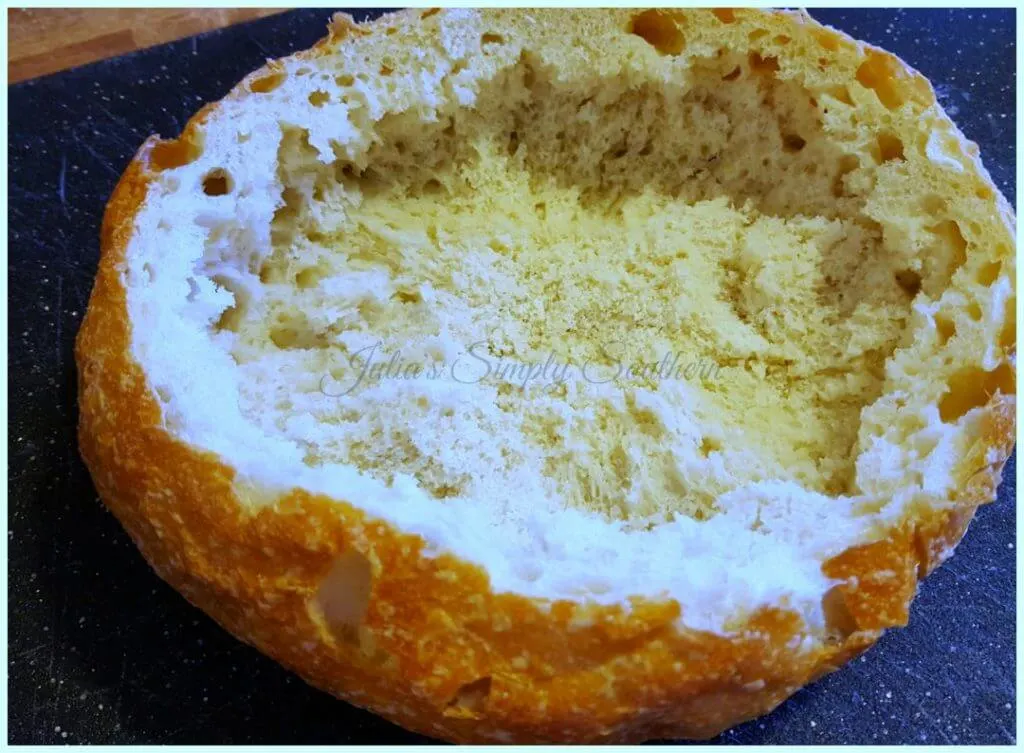 Hollow out a bread bowl