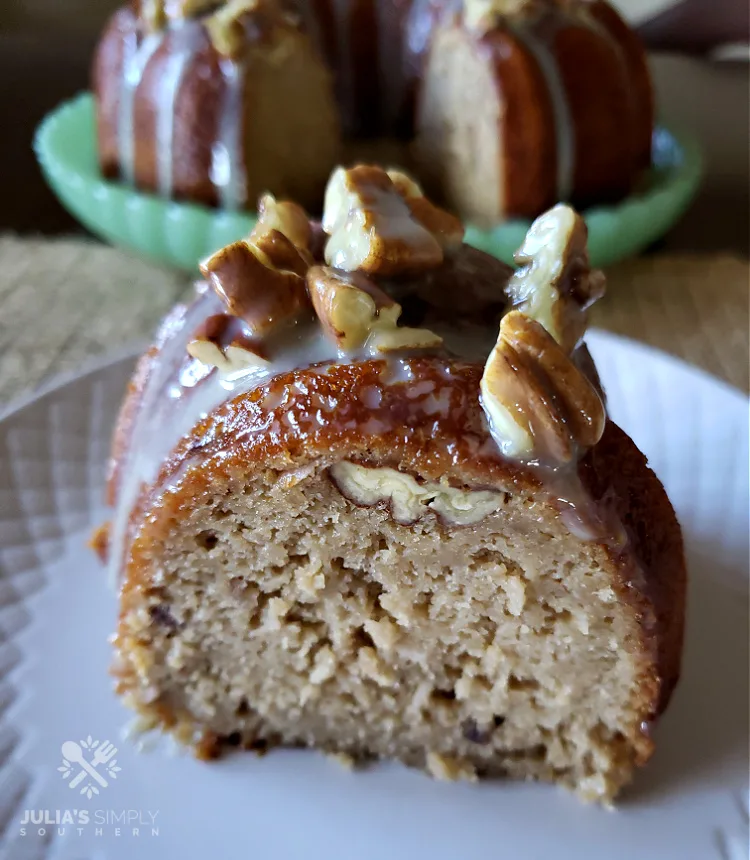 Butter Pecan Pound Cake with Praline Glaze on a white plate