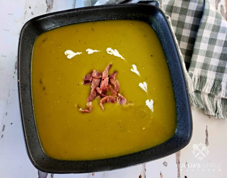 Split Pea Soup garnished with diced country ham and creamed hearts in a dark grey bowl