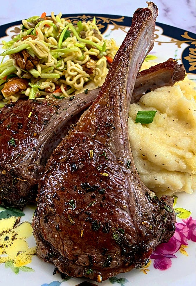 Creamy mashed potatoes, broccoli slaw, and perfectly cooked lamb chops
