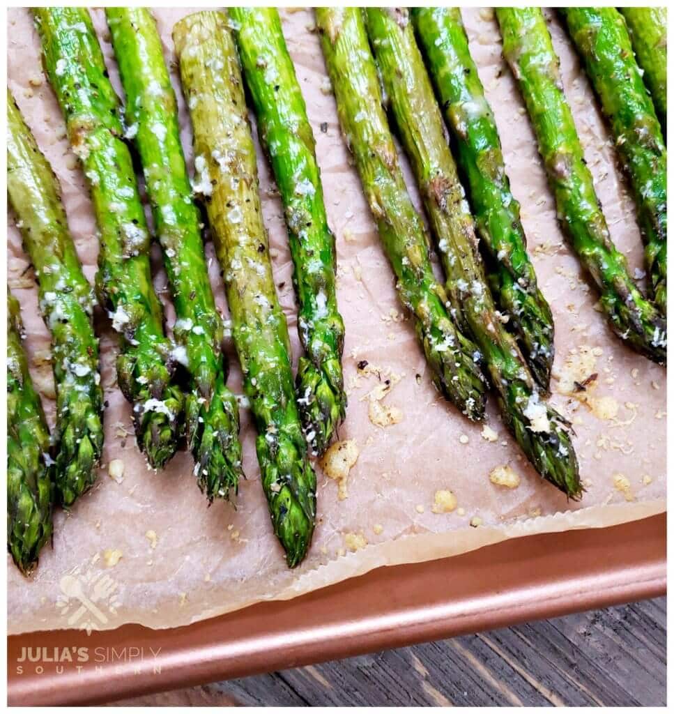 Recipe for roasting thick spears of asparagus seasoned with herbs and Parmesan