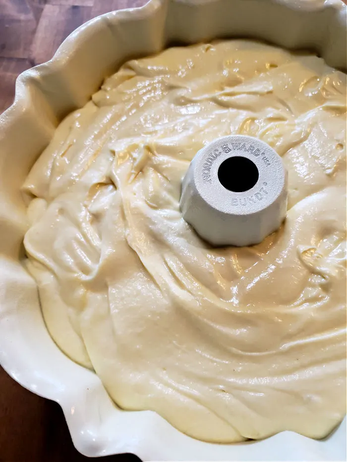 smooth pound cake batter in a bundt pan