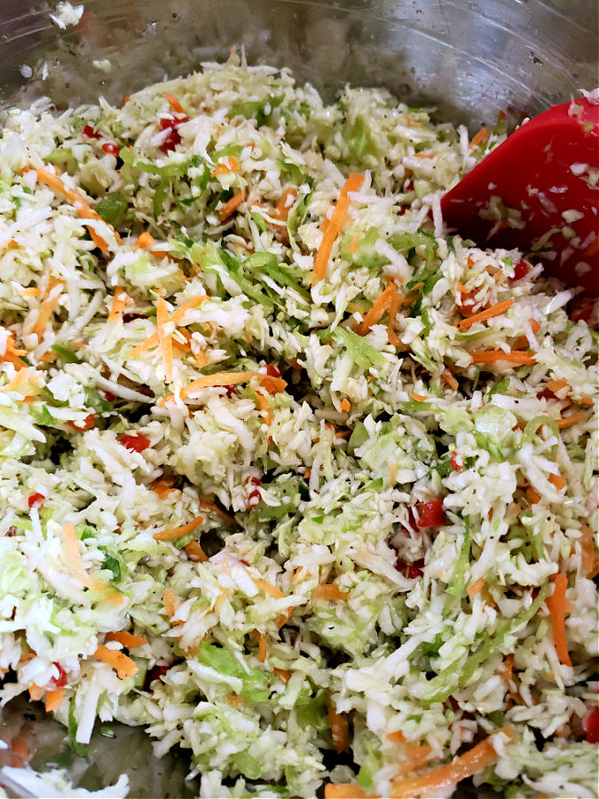 Stainless mixing bowl with combined Amish pepper slaw