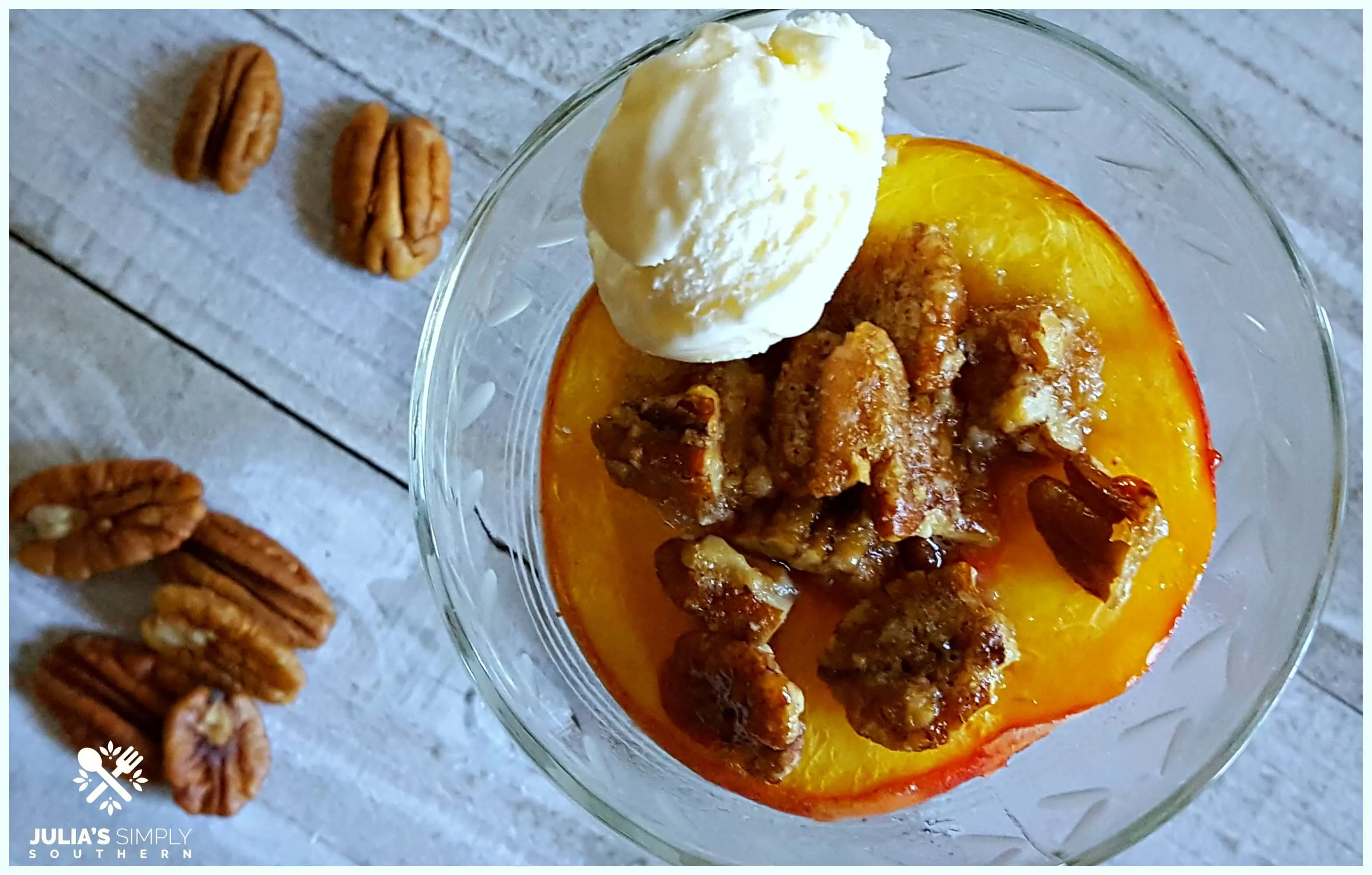 Sophisticated Bourbon Peaches served in a stemmed glass with ice cream