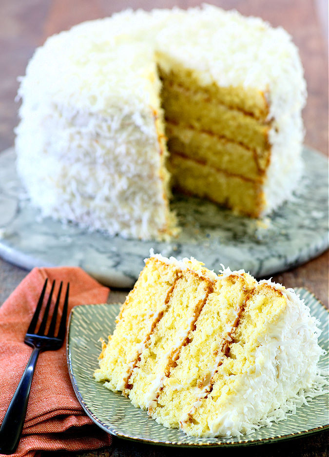 Easter Coconut Cake slice on a plate featured in Southern Easter Desserts and Sweets Recipes
