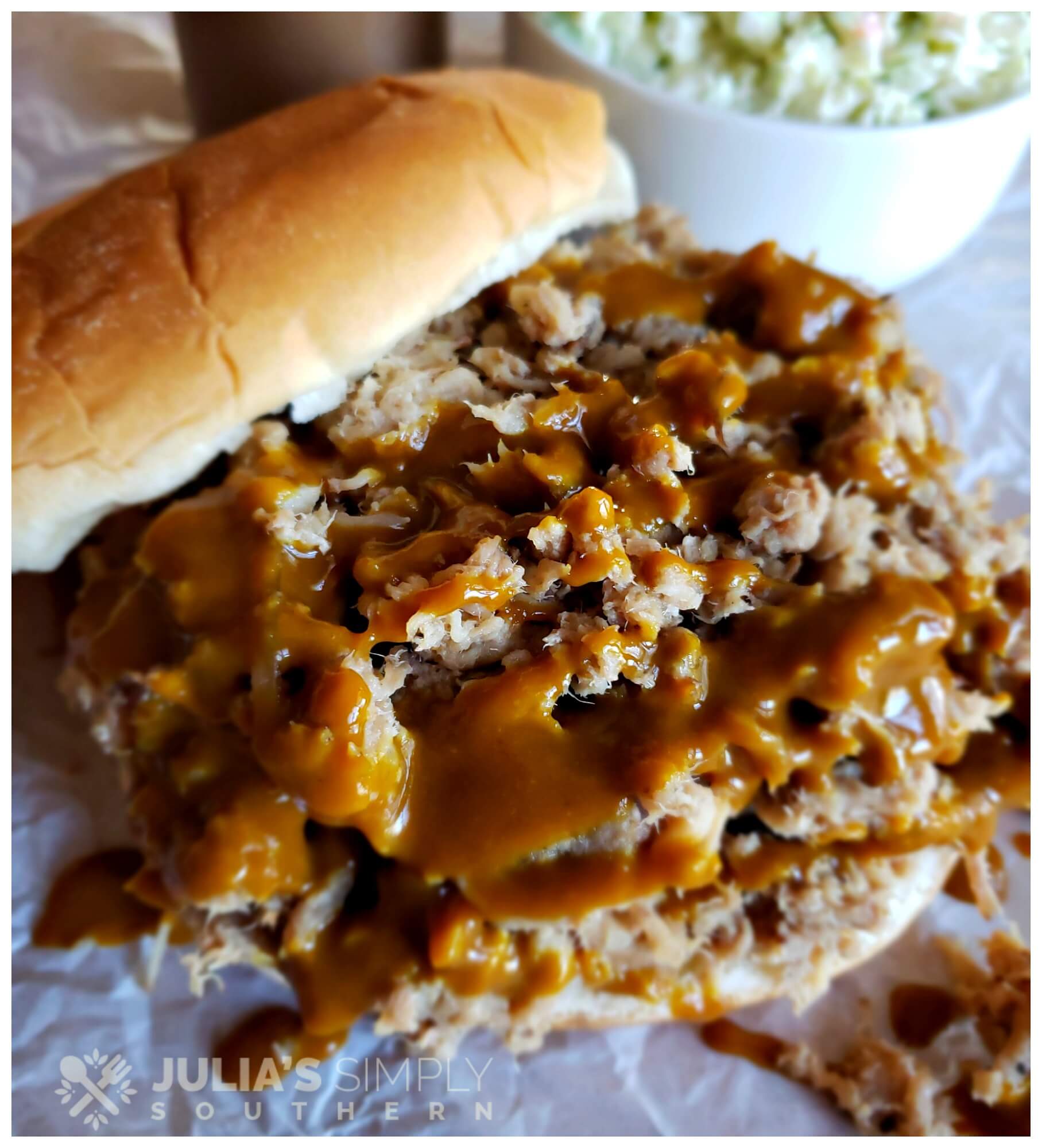 Carolina Gold drizzled over pulled pork on a bun