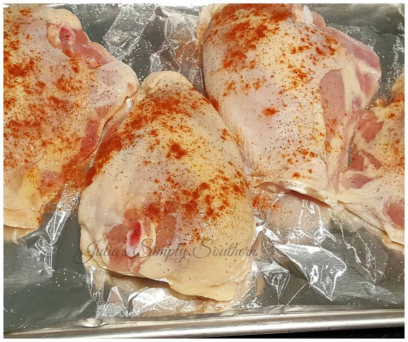 Chicken on a sheet pan to make Southern Baked Barbecue Chicken Breast