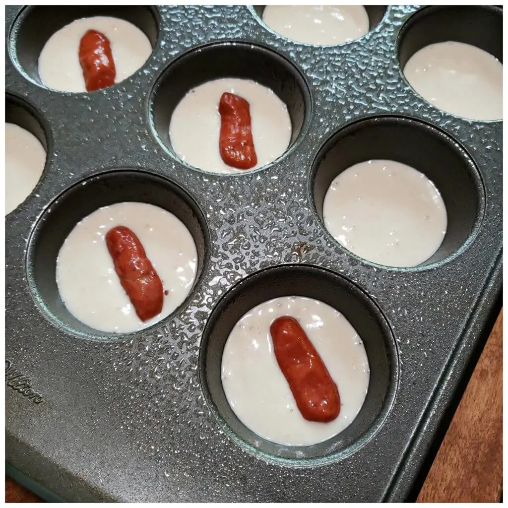 Using a muffin pan to make breakfast piggies - Pancake Pigs in a Blanket