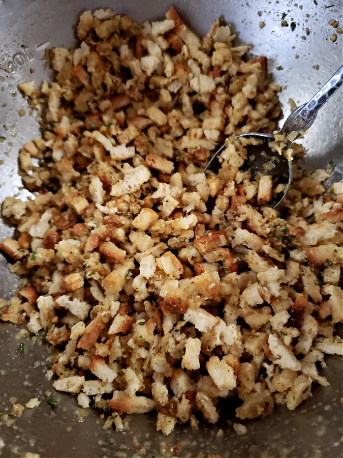 moistened stuffing mixture in a mixing bowl