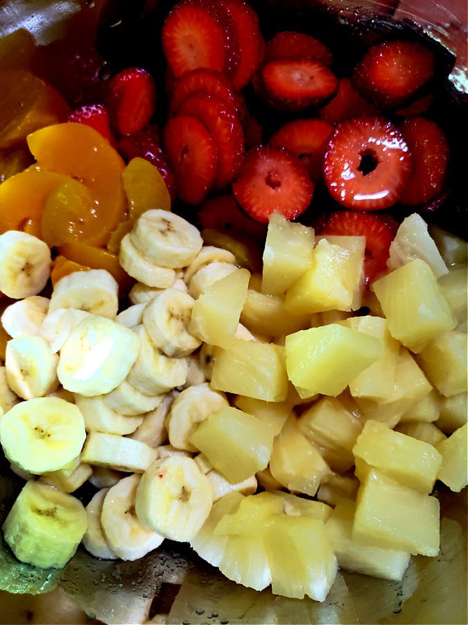 variety of fruits in a mixing bowl