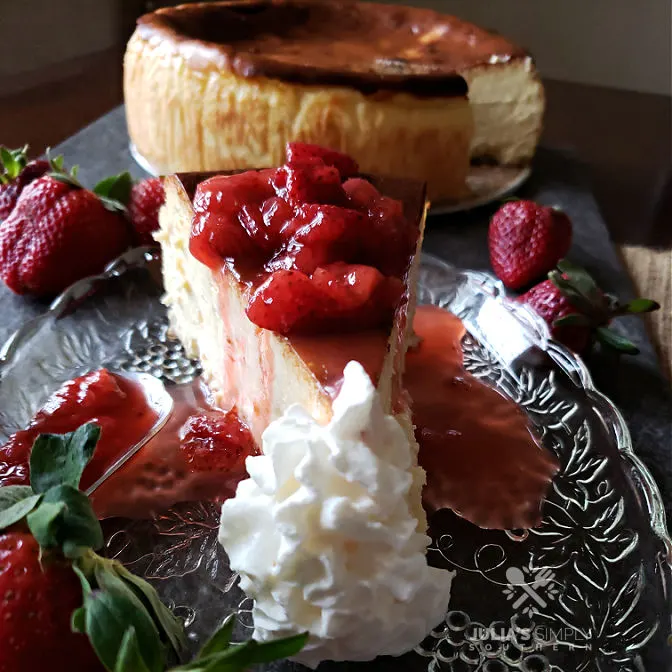 New York style cheesecake from scratch with homemade fresh strawberry topping sauce