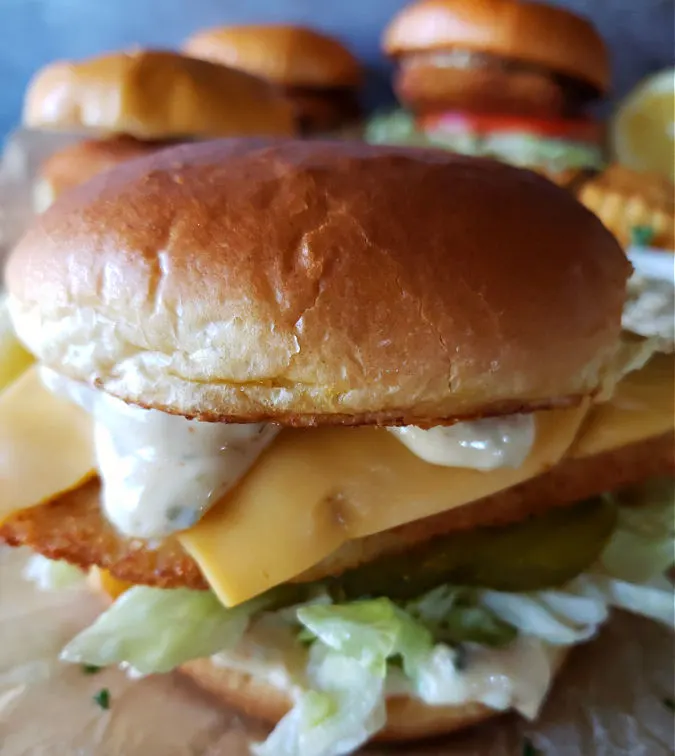 delicious air fryer fish sandwich with homemade tartar sauce and toppings