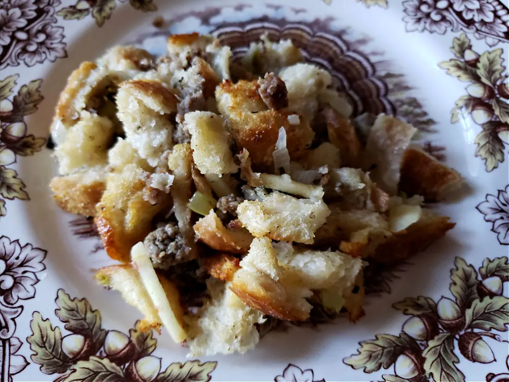 Thanksgiving plate with sausage stuffing on it