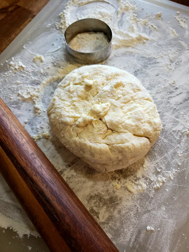 Rolling out biscuit dough