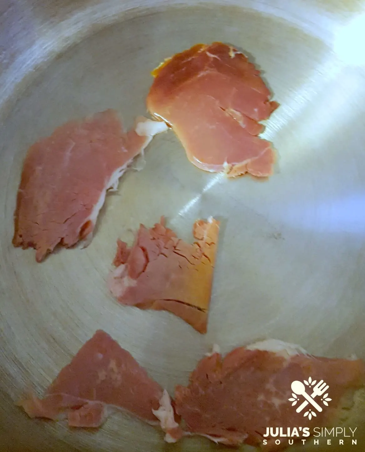 Searing meat pieces before cooking beans