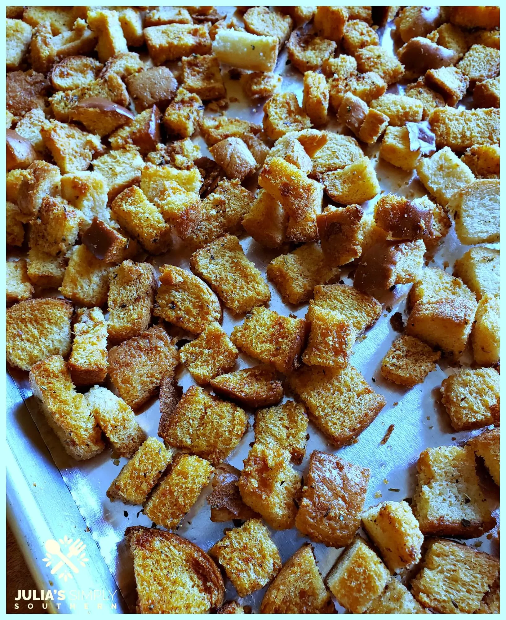 Baking sheet with homemade croutons for salads