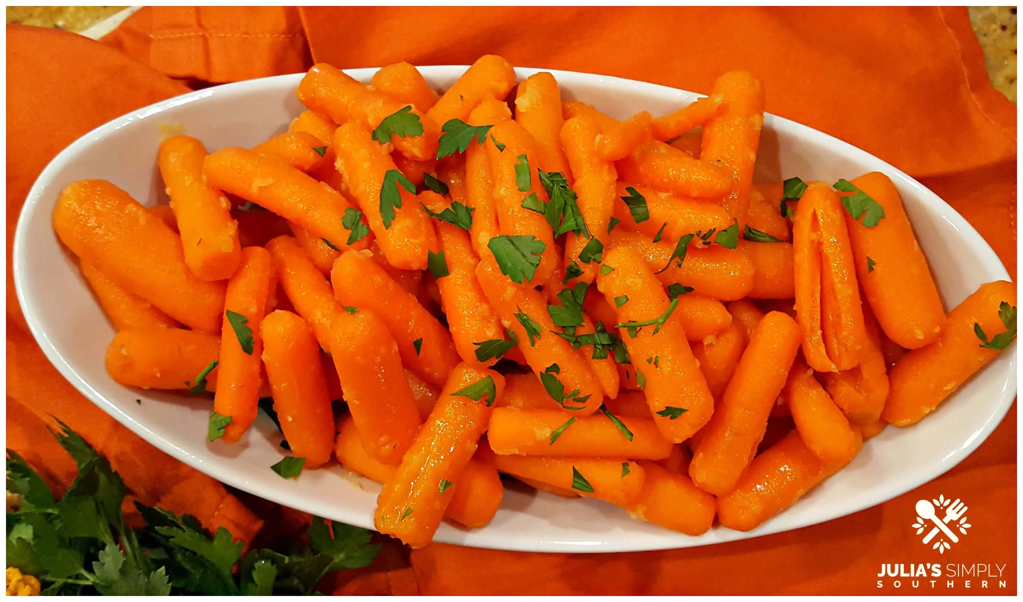 beautiful oval dish with colorful glazed carrots