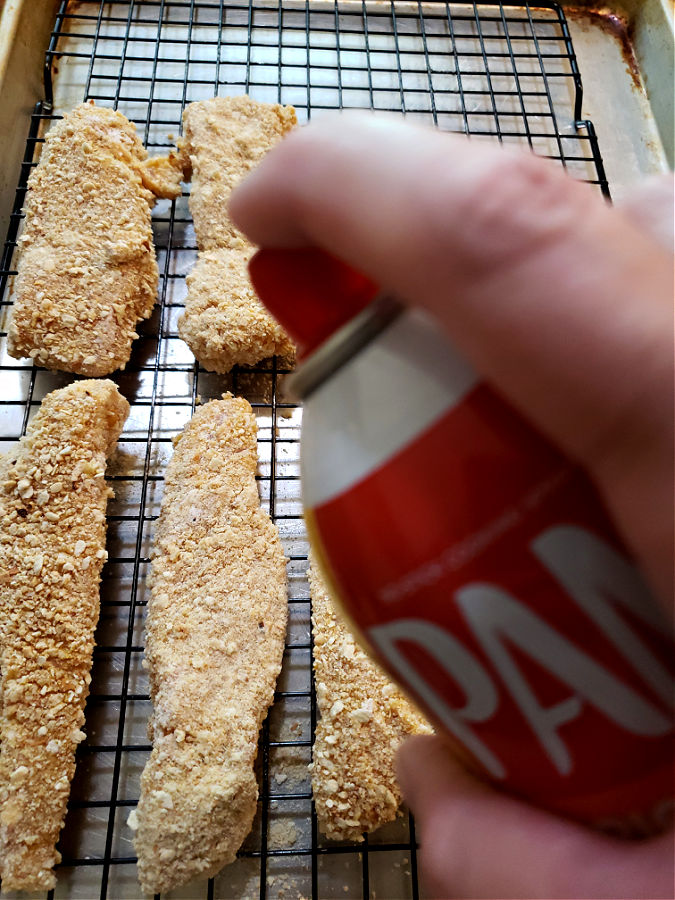 spray chicken to help brown and crisping in oven