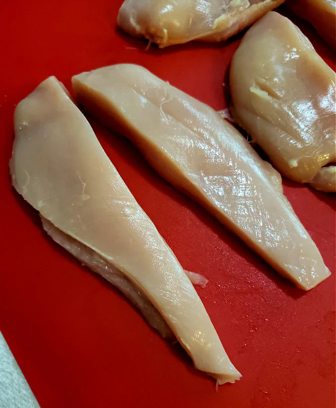 cut chicken breast into strips
