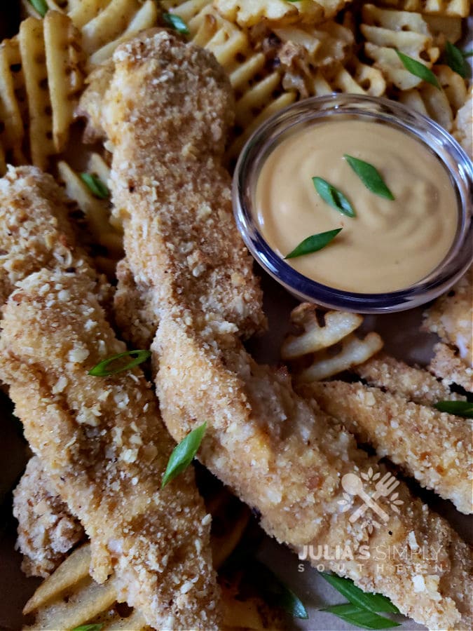 homemade chicken fingers basket with fries. Simple Baked Chicken Tenders Recipe