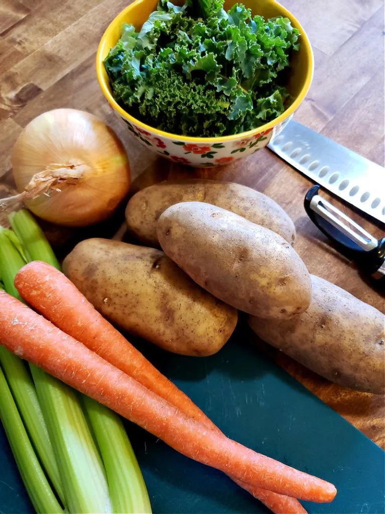 Ingredients to make potato and kale soup