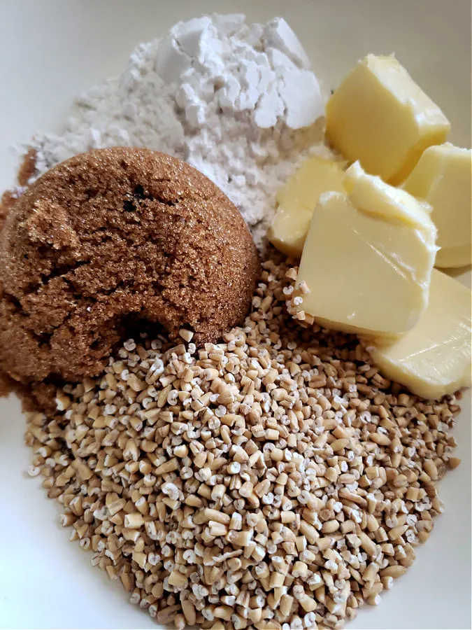 preparing the crumble topping with oats for sweet potato soufflé