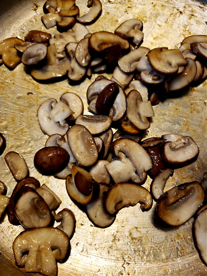 sauté mushrooms in a skillet