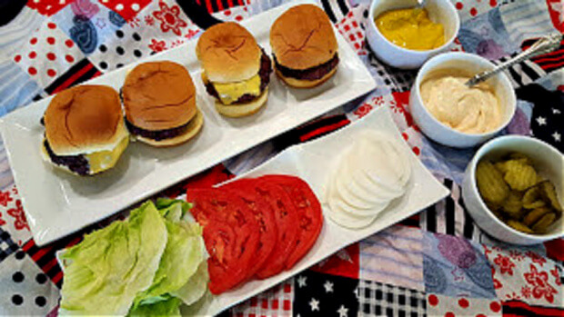 Patriotic display of slider sandwiches with toppings